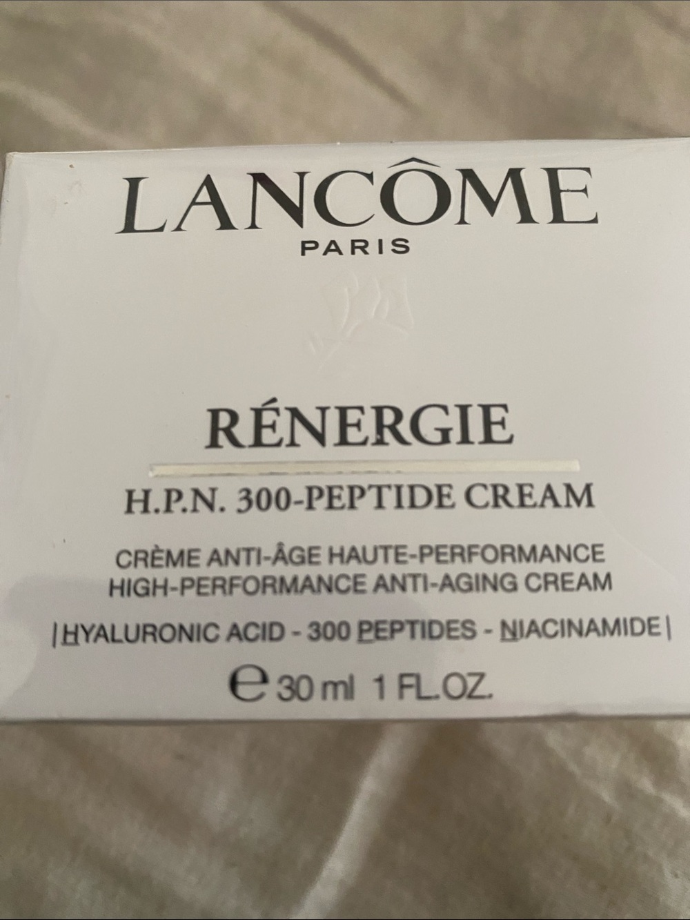 Lancôme Rénergie H.P.N. 300-Peptide Cream — White and Black Text